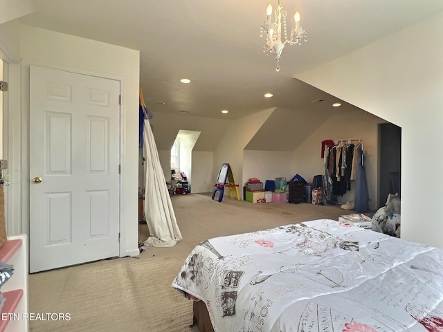 carpeted bedroom with a closet and a chandelier