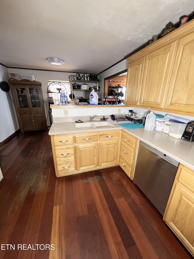 kitchen featuring kitchen peninsula, light brown cabinetry, stainless steel dishwasher, sink, and dark hardwood / wood-style floors