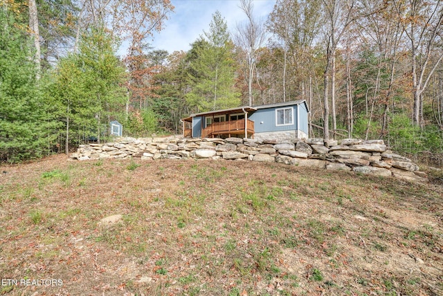 view of yard with a deck