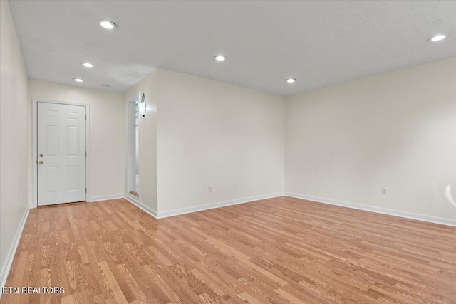 empty room with light wood-type flooring