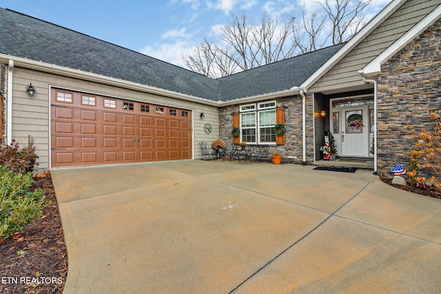 exterior space with a garage