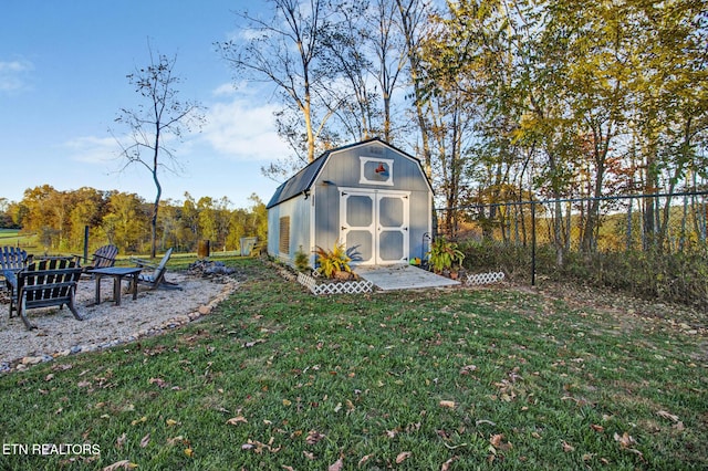 view of outbuilding with a lawn