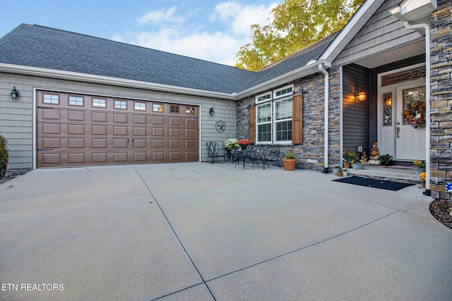 exterior space with a garage