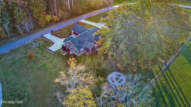 birds eye view of property with a rural view