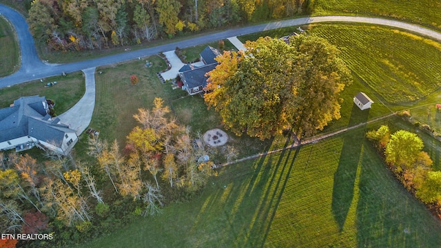 birds eye view of property with a rural view