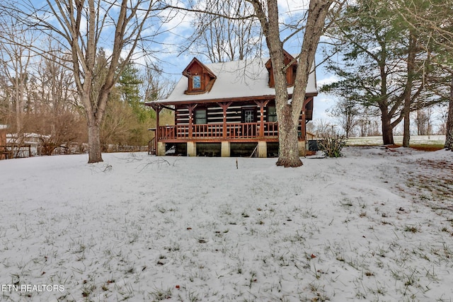 view of snow covered property