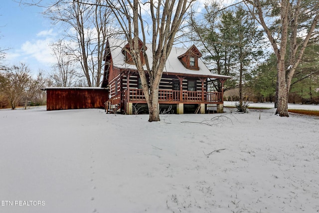 view of snow covered property