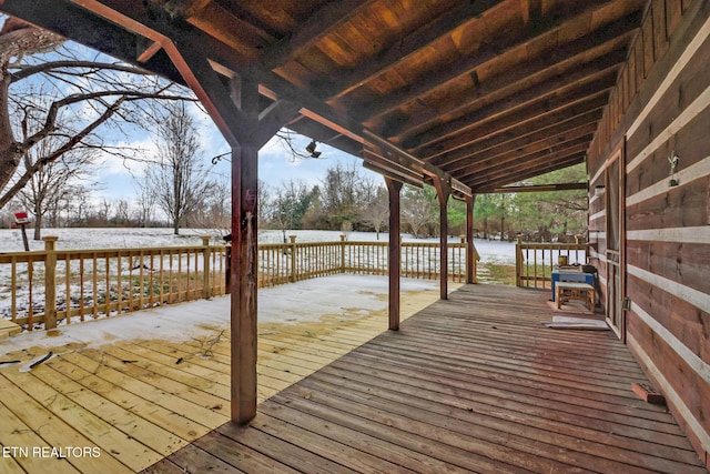 view of snow covered deck