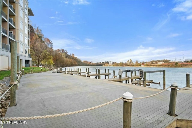 view of dock with a water view