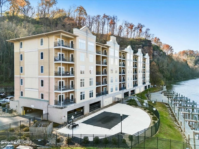 view of building exterior with a water view