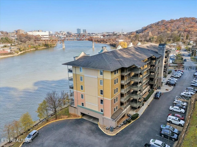 birds eye view of property featuring a water view