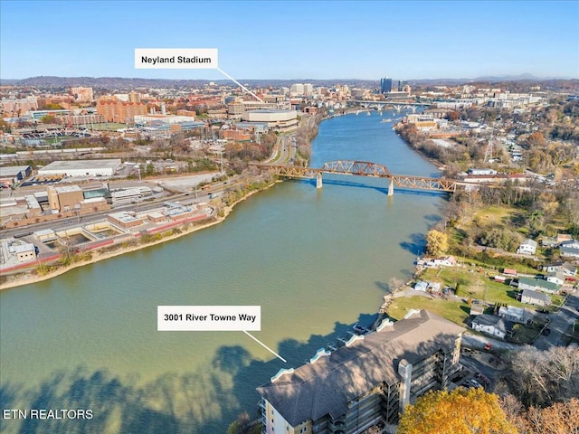 birds eye view of property featuring a water view