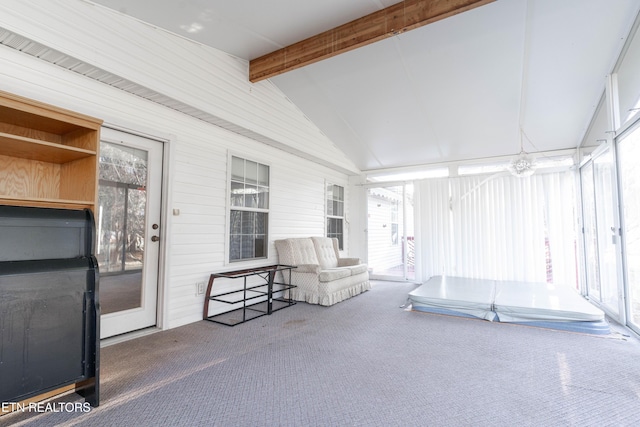 unfurnished sunroom with a chandelier and lofted ceiling with beams