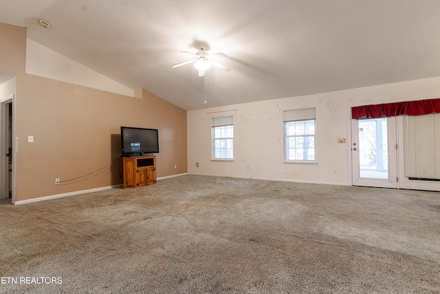 unfurnished living room with carpet flooring, ceiling fan, and vaulted ceiling