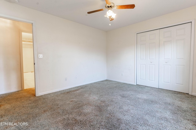 unfurnished bedroom with ceiling fan, carpet floors, and a closet