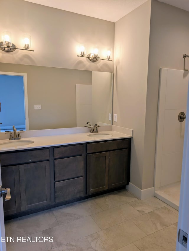 full bath featuring double vanity and a sink