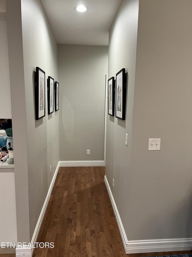 hall featuring dark hardwood / wood-style floors