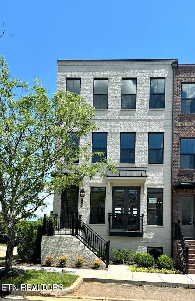 view of front facade featuring french doors