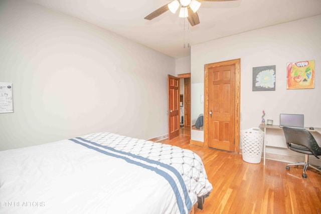 bedroom featuring ceiling fan and wood-type flooring