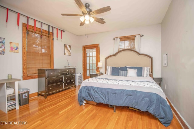 bedroom featuring ceiling fan and hardwood / wood-style flooring