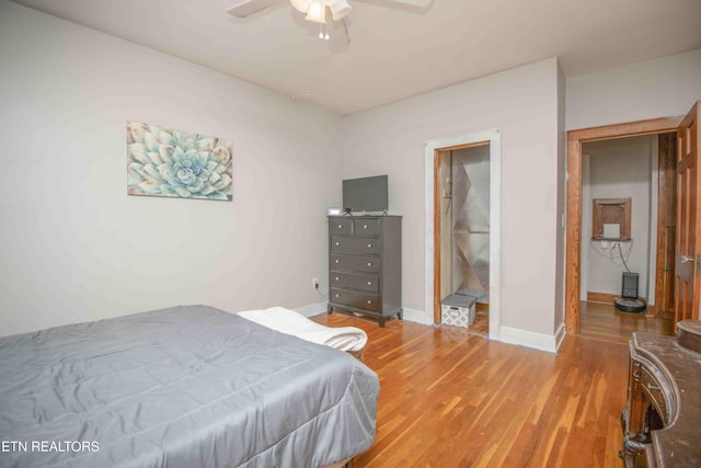 bedroom featuring ceiling fan and light hardwood / wood-style floors