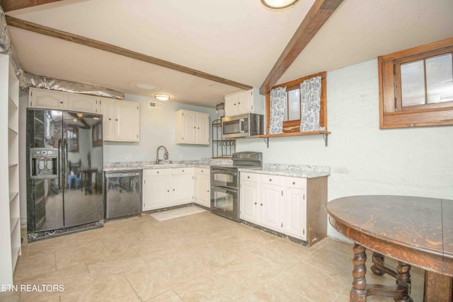 kitchen with black appliances, sink, and beamed ceiling