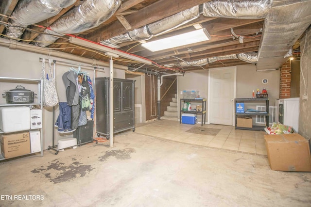 basement with washer / dryer