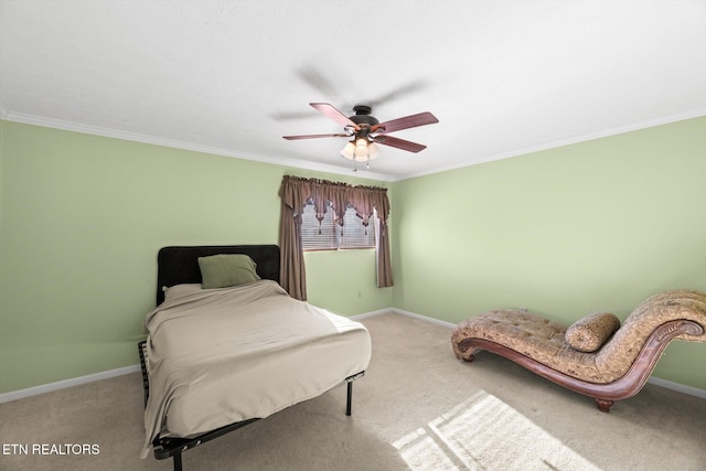 bedroom with ceiling fan, light colored carpet, and ornamental molding