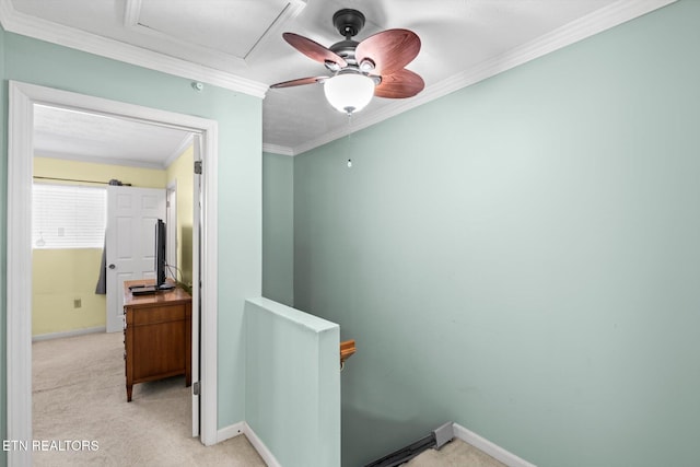 hall with light colored carpet and ornamental molding