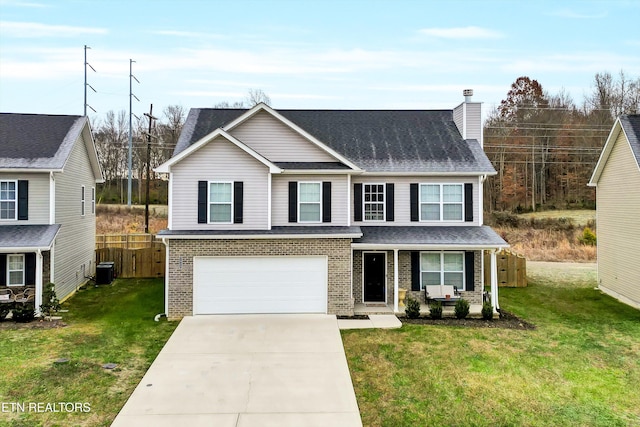 view of front facade featuring a garage and a front lawn