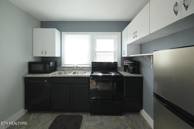 kitchen featuring white cabinets, sink, and black appliances