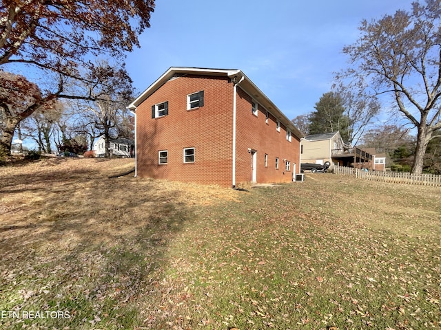 view of property exterior featuring a yard