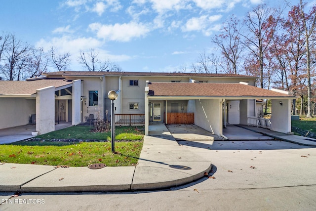 view of front of house with a carport