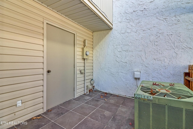 doorway to property with central AC