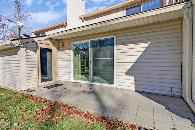 rear view of house with a patio area