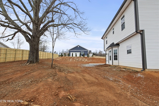 view of yard featuring fence