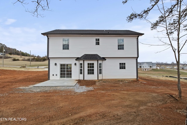 rear view of house featuring a patio