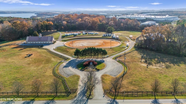 aerial view with a rural view and a water view