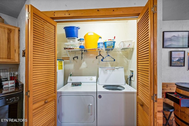 laundry area with separate washer and dryer