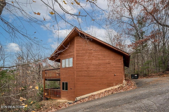 view of property exterior with a balcony