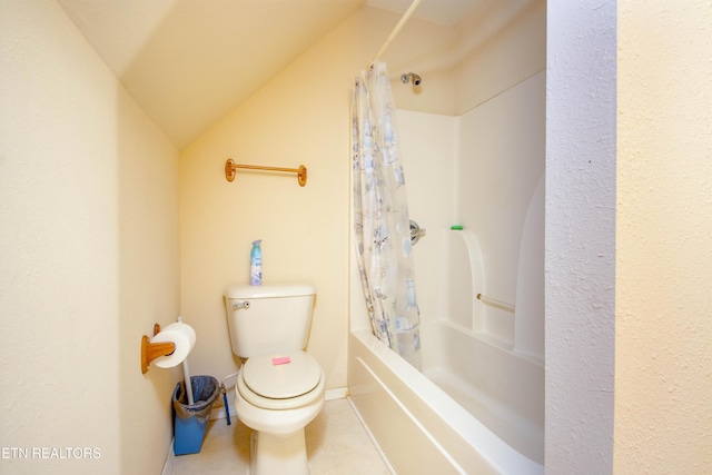 bathroom featuring toilet, tile patterned flooring, shower / bath combo with shower curtain, and lofted ceiling