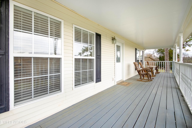 deck featuring covered porch