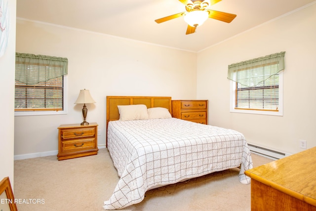 carpeted bedroom with baseboards, crown molding, baseboard heating, and ceiling fan