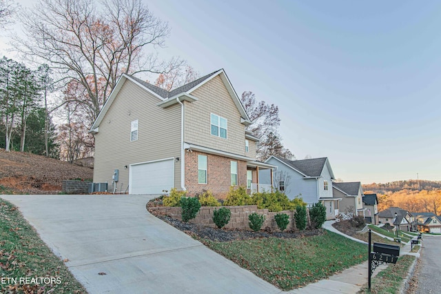 view of property exterior with a garage