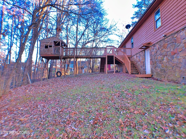 view of yard with a deck