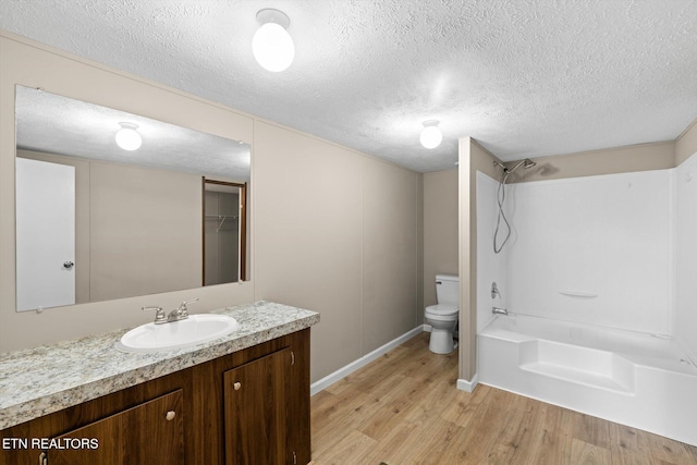 1202 Greenpond Rd, Decatur, TN 37322 - full bathroom featuring hardwood / wood-style flooring, vanity, toilet, and a textured ceiling