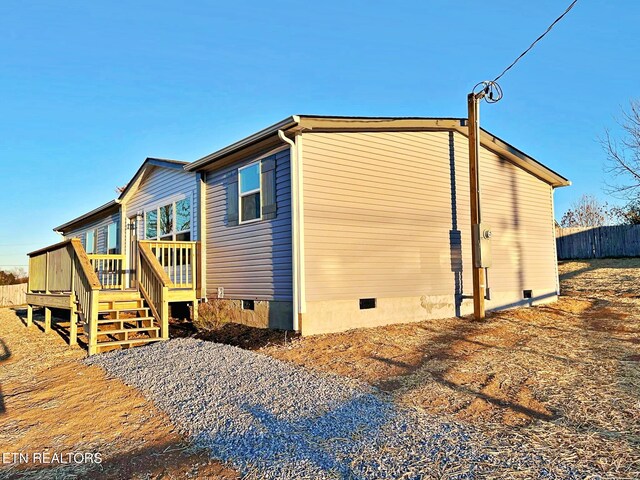 exterior space with a wooden deck