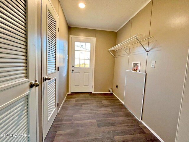 laundry area featuring hookup for a washing machine and dark hardwood / wood-style flooring