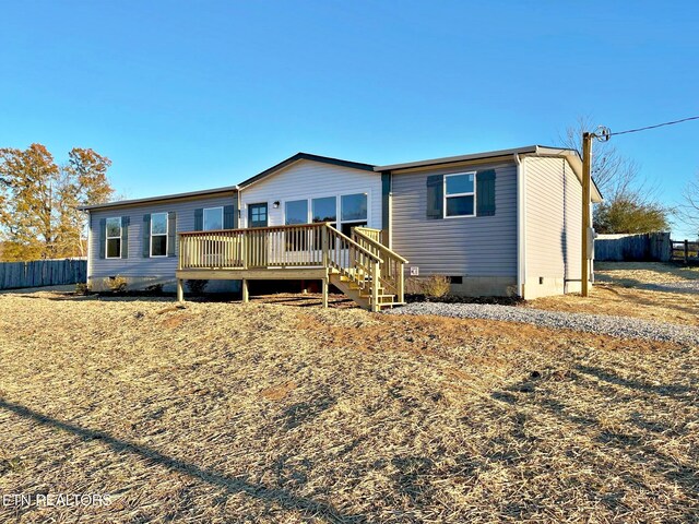 rear view of house with a deck