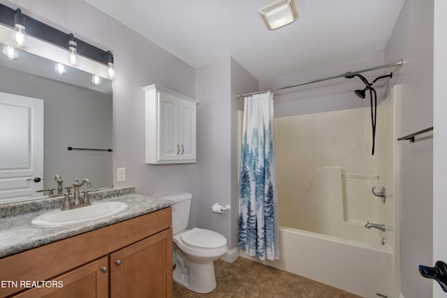 full bathroom with shower / bath combo with shower curtain, tile patterned floors, toilet, and vanity